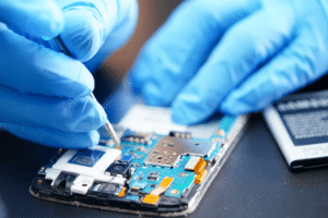technician repairing a phone